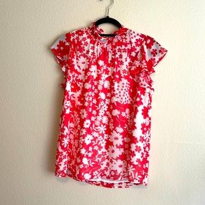 Beautiful flowly flowered top never worn from Soto. Size S